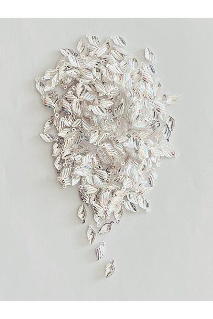 New Leaf Janjanli Writing, Evening Dress, Anklet, Necklace. Plexiglass Pul. 20 Grams. Estimated: 280-290 Units. White.