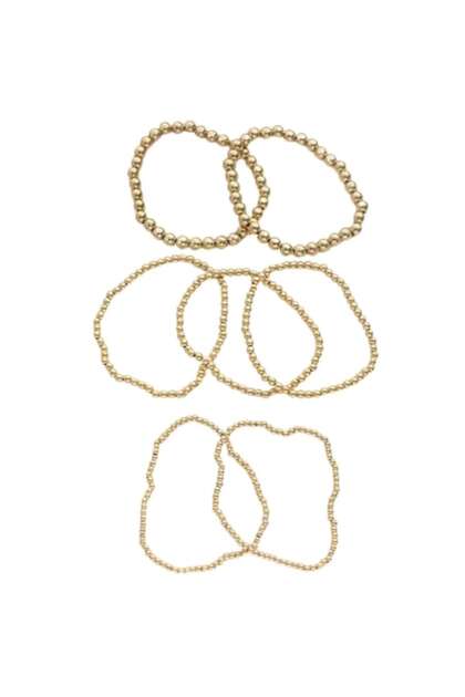 - Set de 7 brățări elastice cu mărgele de diferite dimensiuni, mărime universală a elasticului, unisex, aurii