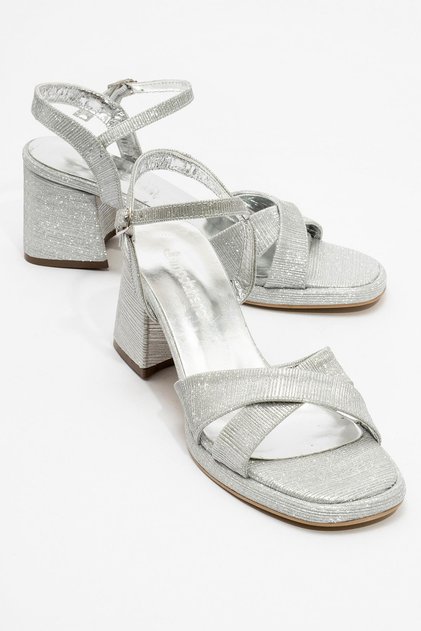 Woman's glittery high heel shoe silver glitter
