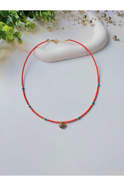 Sand Bead Necklace with Orange Eye and Evil Eye Bead Detail