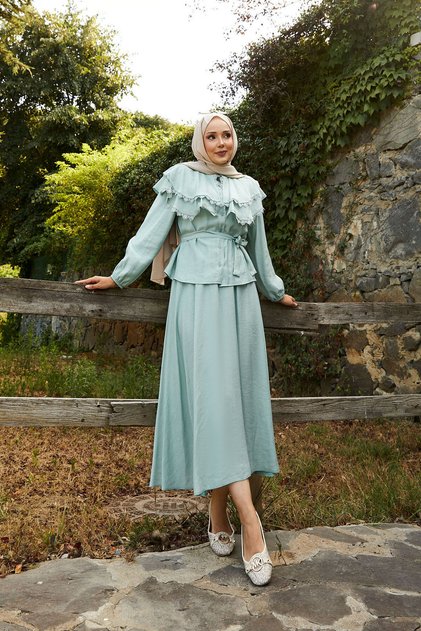 Mint-Colored Suit with an Allerli Guipure Detailed Skirt on the Front.