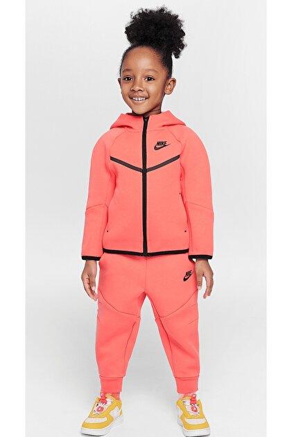 orange nike tech suit