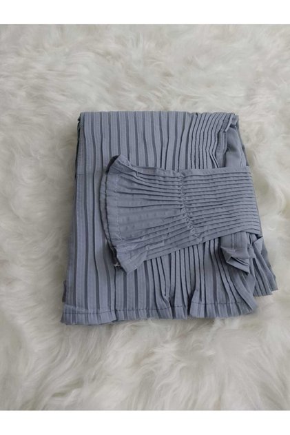 A prayer rug with a pleated design, made of soft, comfortable and cool fabric to give you comfort and elegance.
