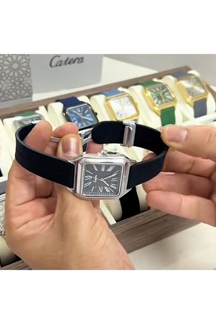 ساعة رجالية بإطار فضي وحزام مطاطي أسود من