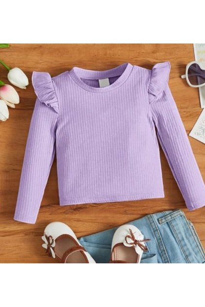 Devojčica, bluza sa dugim rukavima i volanima na ramenu