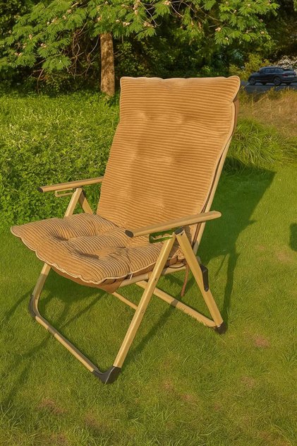 Travel chair with fabric upholstery