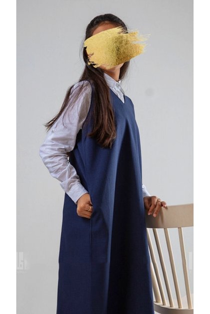 Navy blue high school uniform with a triangular cut