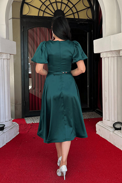 green dress with red belt Business Lady in Official Formal Clothes Green Dress with Red Belt High Heel Shoes Full Body Photo Isolated on White Stock Photo