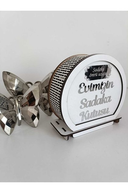 Our House's Charity Box Is White and Silver.