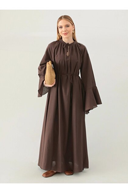 brown dress in spanish These Spanish Sisters Have the Sultry Linen Dresses, Caftans, and Jewelry You'll Wear All Summer
