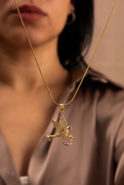 Gold-Colored Love Necklace with a Bird Wearing a Solitaire Ring - Steel Necklace