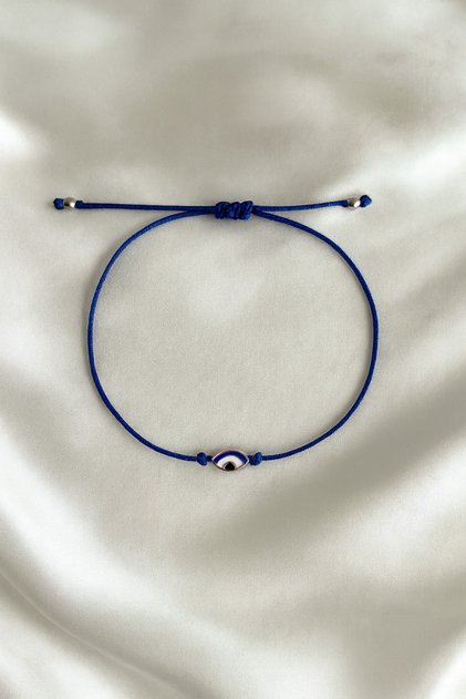 Adjustable String Bracelet with Evil Eye Bead and Eye Figure - Does Not Tarnish