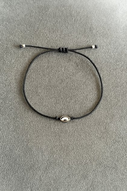 Adjustable String Bracelet with Evil Eye Bead and Eye Figure - Does Not Darken