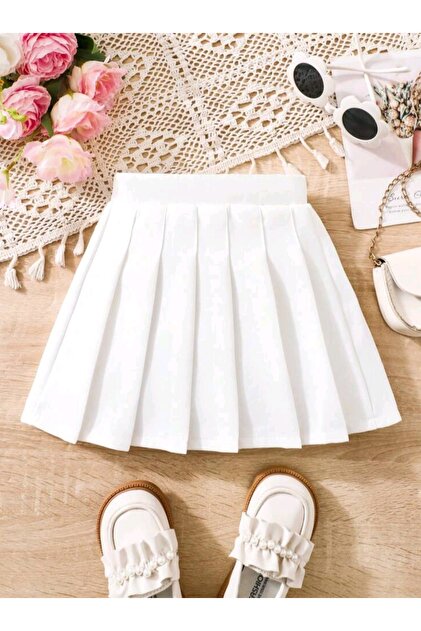 Kız çocuğu beli lastikli önü bileli mini etek ( fotoğrafta beden tablosu mevcuttur)