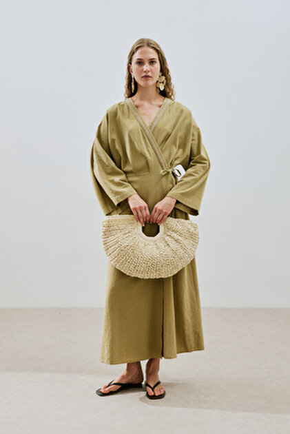 manuka brown dress MOSSE HIGH NECKLINE ASYMMETRIC TWIST STRAP DETAIL MAXI DRESS main image 0