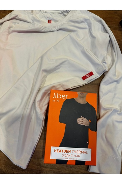 Heated Comfort Thermal Top That Does Not Cause Moisture or Odor