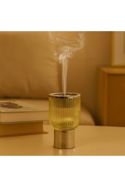 A luxurious light gold glass incense burner from ✨