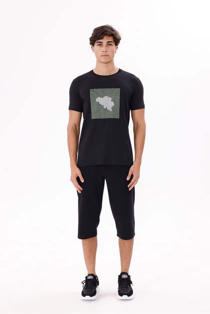 Silhouette of Printed Bicycles on a Square Grid Floor Comfortable Fit Short Sleeve T-Shirt