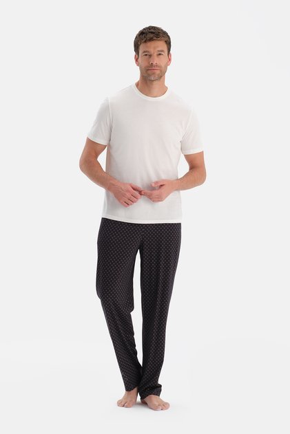 Pantaloni din modal din bumbac Black Metro cu imprimeu
