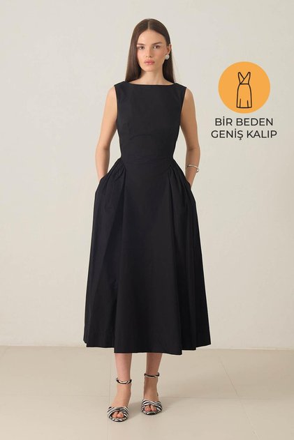 Rochie fără mâneci, cambrată în talie, cu wide leg, lungime midi, neagră