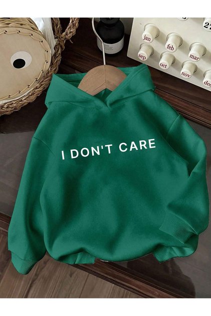 I Don'T Care Written Women's Oversized Hooded Sweatshirt