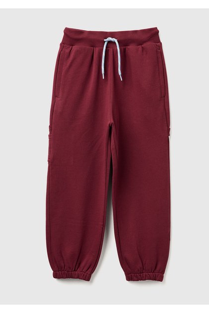 Boy's burgundy drawstring sweatpants with pocket detail and elasticated ankle