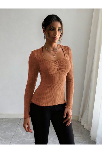 بلوزة نسائية برتقالية بأكمام طويلة ومضلعة