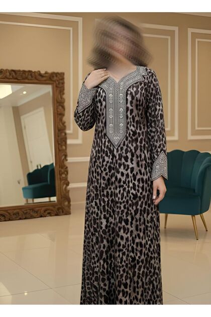 Elegant Ramadan-themed abayas/dresses with a leopard print, sparkling crystal embroidery.
