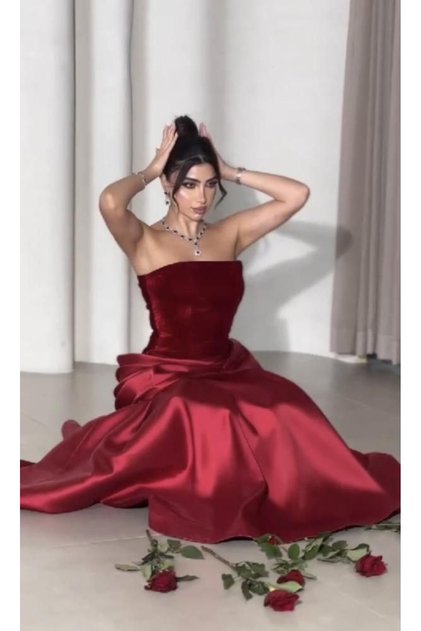 Elegant evening dress in a royal burgundy color