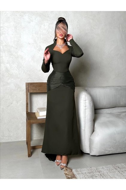 An elegant, long evening dress in olive or dark green.