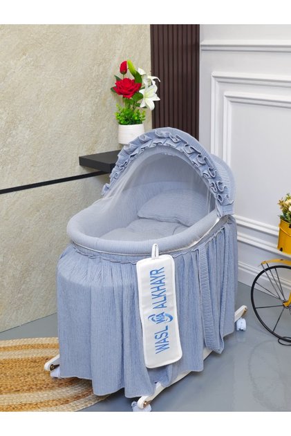 Moses basket baby crib in a calming blue-grey color with mosquito net and wheeled stand