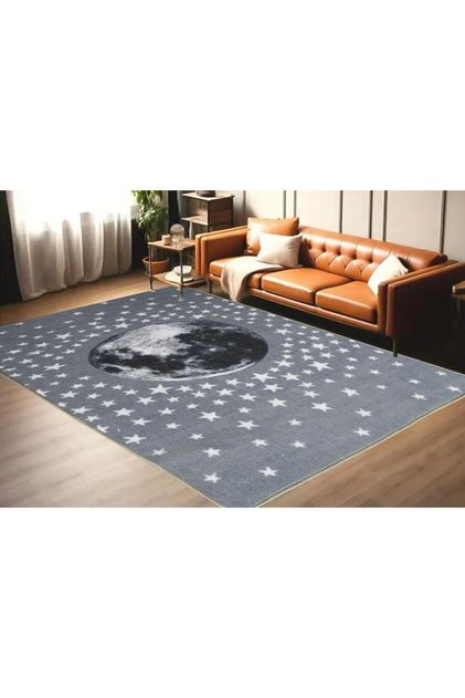 A rug decorated with a multi-colored moon and stars print, 100 x 150 cm