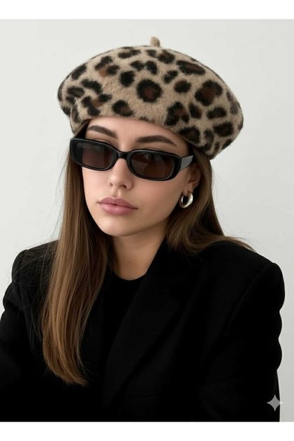 Leopard patterned feathered painter's hat