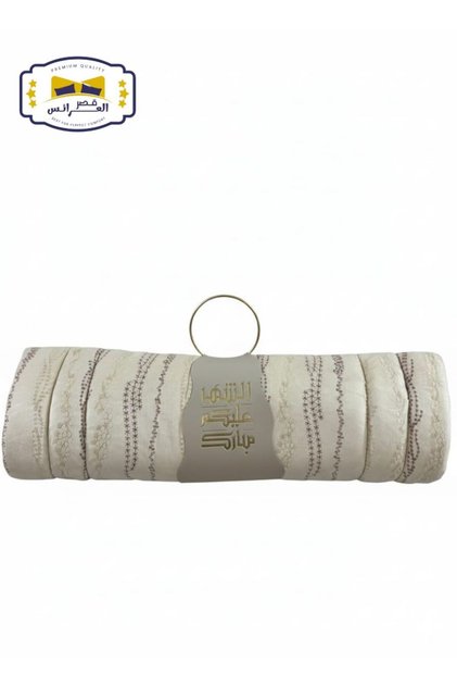 Embroidered prayer rug with a matching strap and prayer beads as a gift