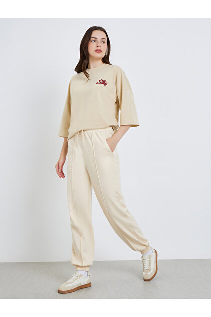 Women Beige Tapered Joggers with Drawstring