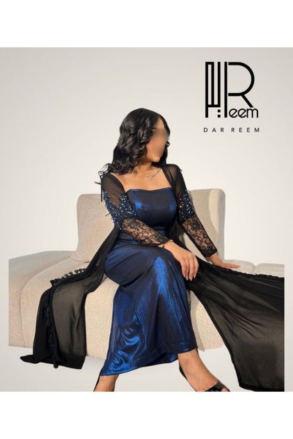 Reem's midnight blue chiffon and crystal dress