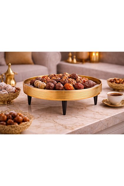 A luxurious round metal serving stand in gold ✨ | 30 x 12 cm. Exceptional elegance for serving guests.