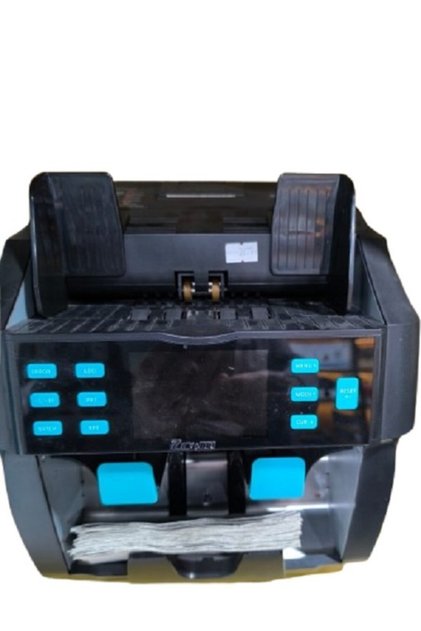 CASH COUNTING MACHINE