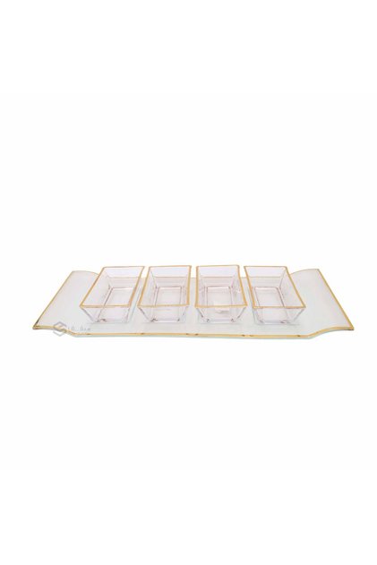 Golden divided plates of sweets and nuts