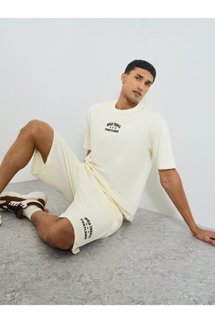 Men Cream Minimal Print Oversized T-Shirt and Shorts Co-Ords