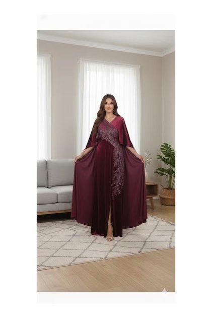 A luxurious evening dress with a wide, flowing silhouette and draped cape sleeves; a fashionable and modern dress.