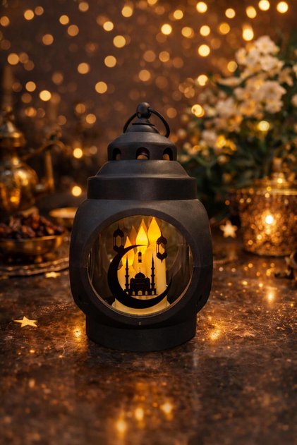 Ramadan lantern with an Islamic pattern, illuminated with a soft light, made of plastic.