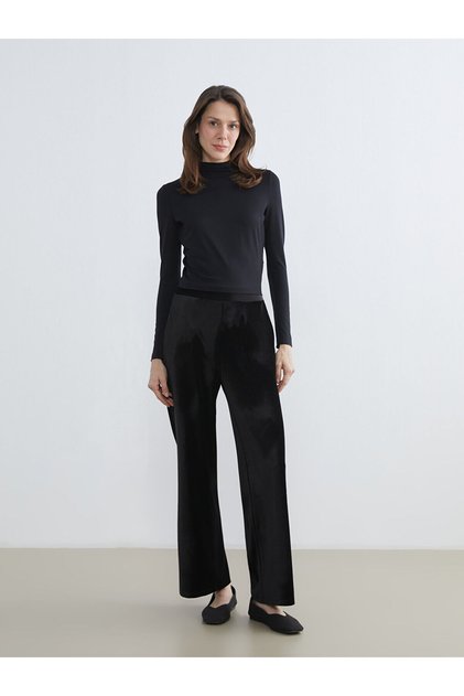 Black velvet women's pants with elastic waist from plus-store