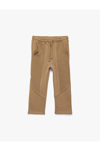 Огромни джогъри с джобове и еластична талия