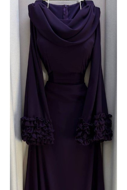 Elegant lilac chiffon maxi dress with long sleeves and soft, multi-layered ruffles at the hem.