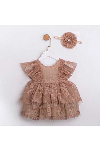 Ruffled Baby Girl Romper with Ribbon Hair Accessory and Back Detail
