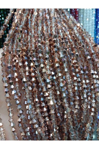 4 mm Pyramid Crystal Glass Beads 10 Strands. Color: Semi-Transparent Semi-Copper