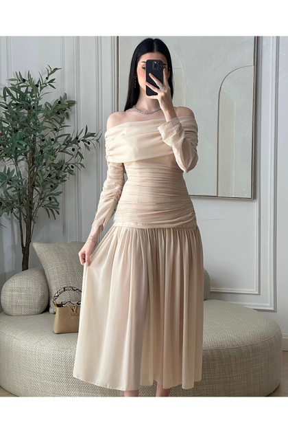 A beige chiffon georgette dress for a soft and elegant look at events.