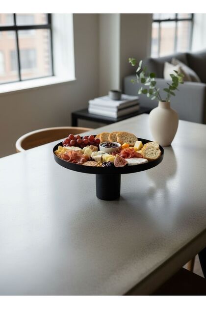 A tall serving tray with a luxurious, modern design.