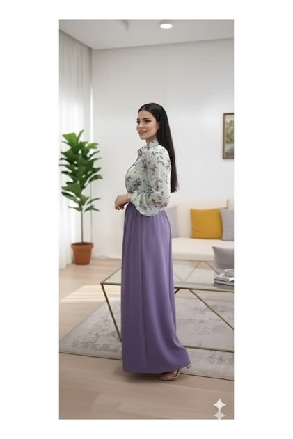 A stylish two-piece set consisting of an attractive long-sleeved blouse and a wide skirt with distinctive details; a fashionable outfit.